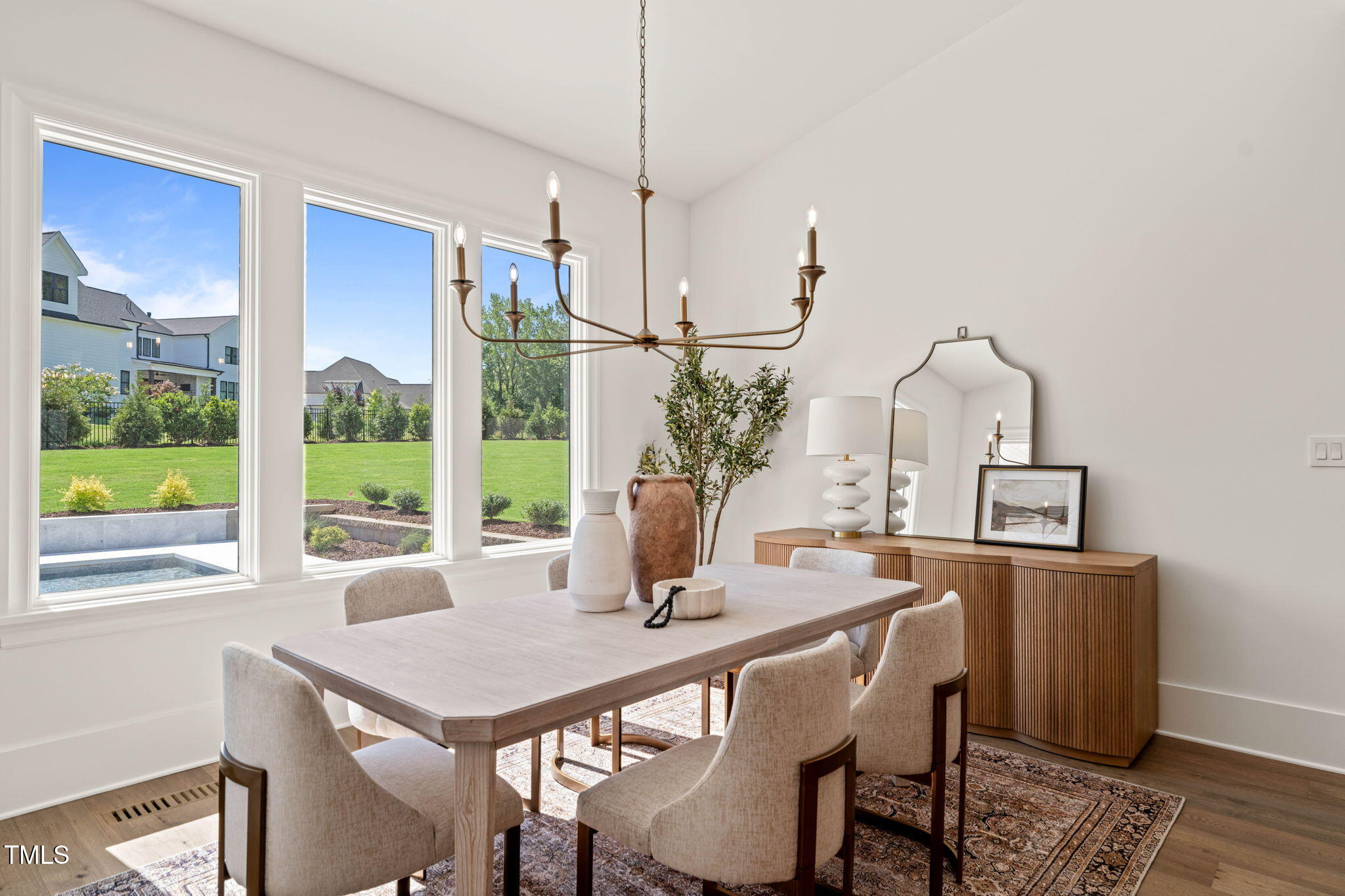 1608 Legacy Ridge Lane Wake Forest, NC 27587 - Photo 20 of 74 a view of a dining room with furniture window and outside view