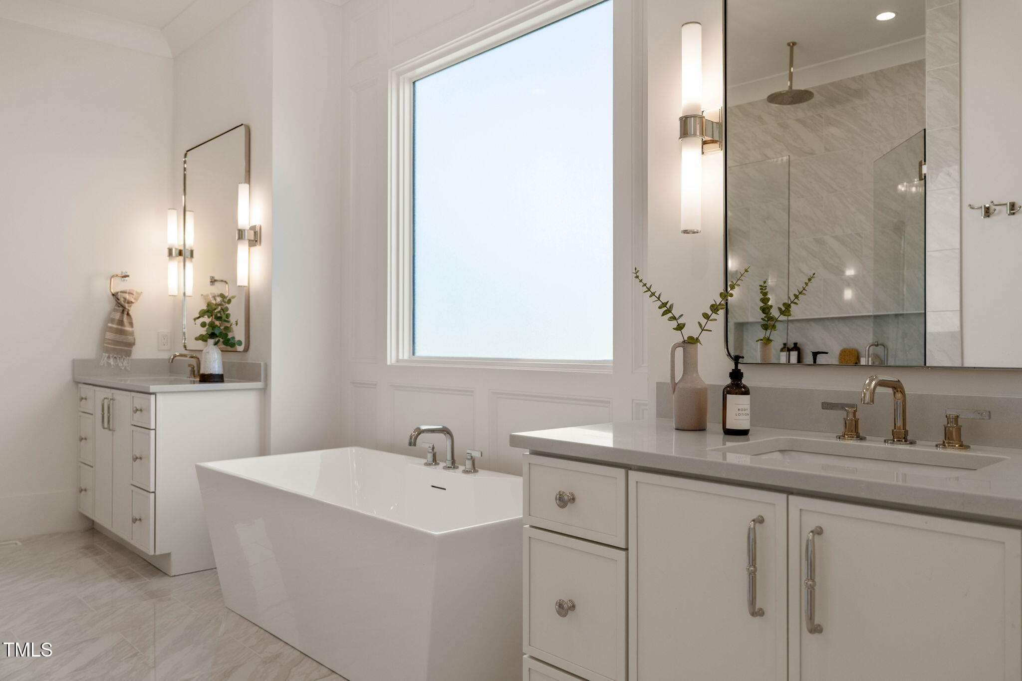 1608 Legacy Ridge Lane Wake Forest, NC 27587 - Photo 38 of 74 a bathroom with double vanity sink a mirror and a shower
