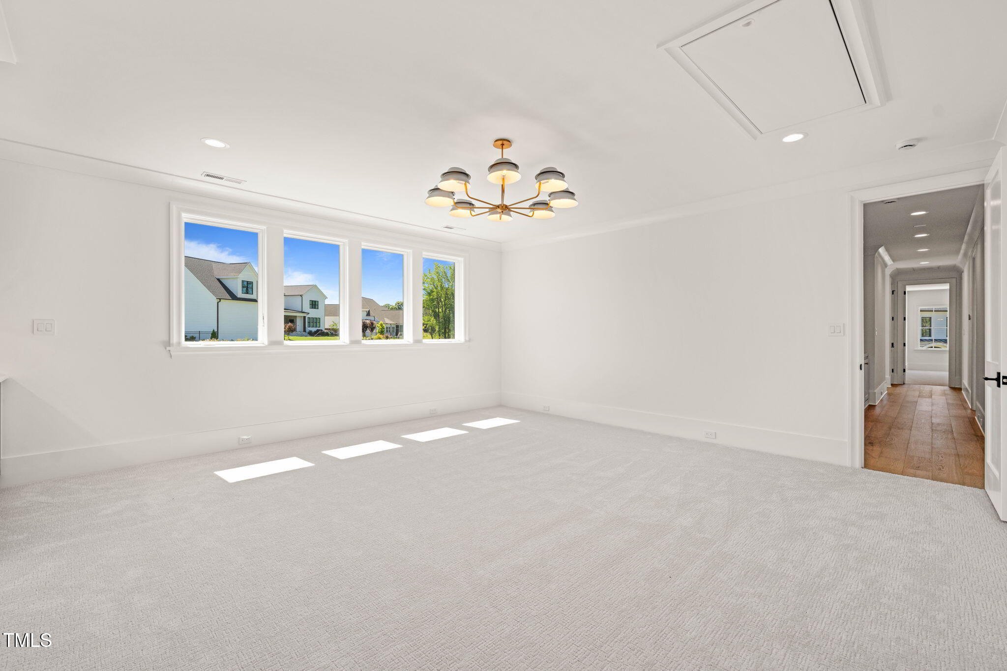 1608 Legacy Ridge Lane Wake Forest, NC 27587 - Photo 47 of 74 a view of an empty room with a window