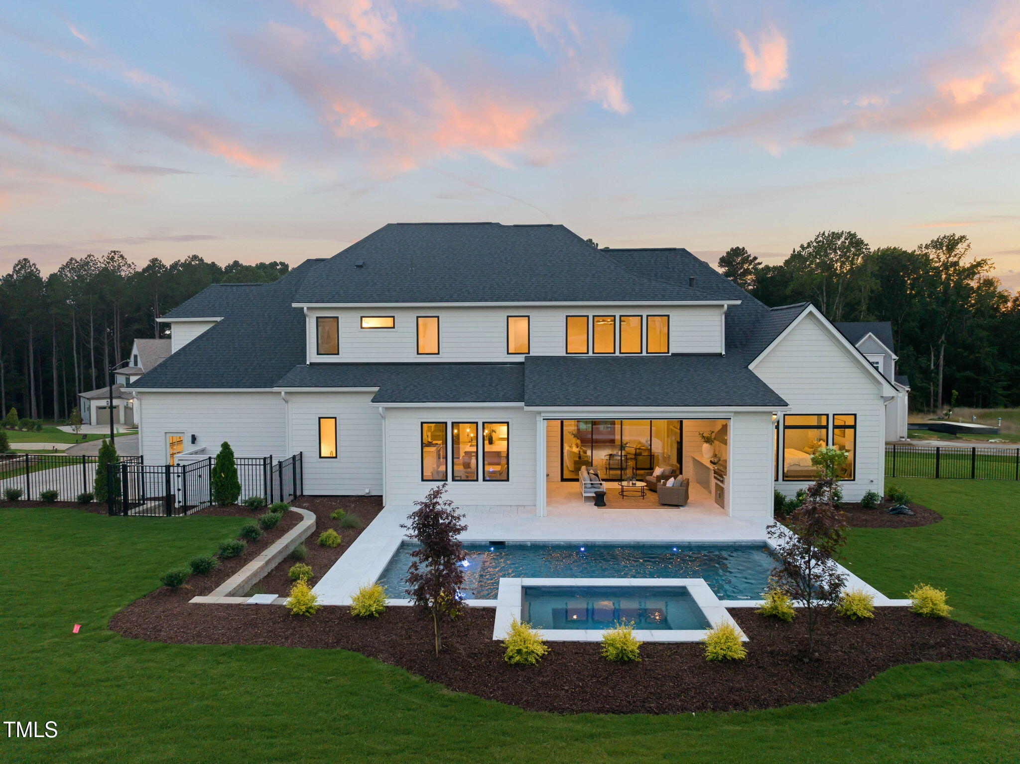 1608 Legacy Ridge Lane Wake Forest, NC 27587 - Photo 66 of 74 a front view of house with yard and swimming pool