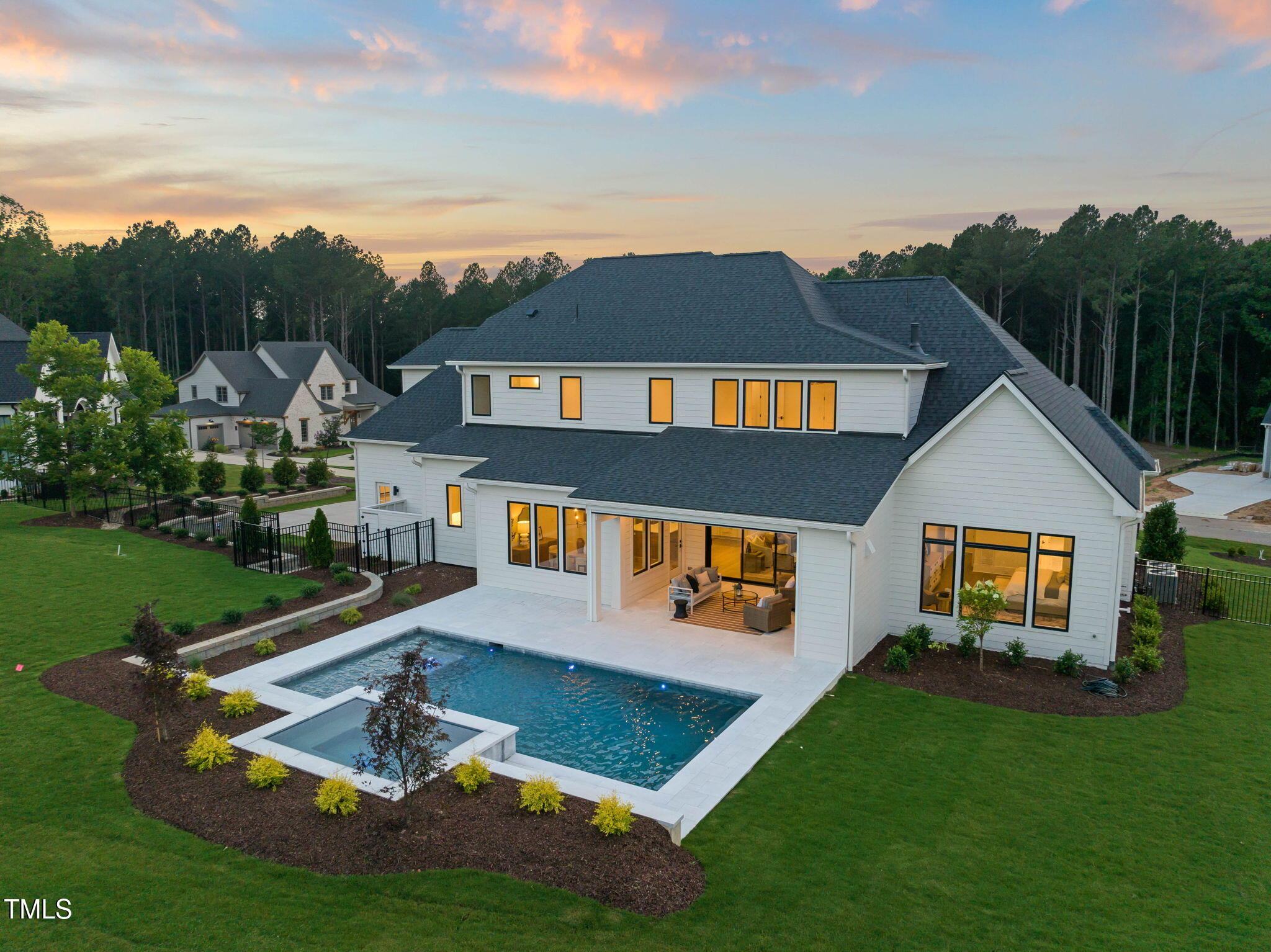 1608 Legacy Ridge Lane Wake Forest, NC 27587 - Photo 67 of 74 a front view of a house with garden