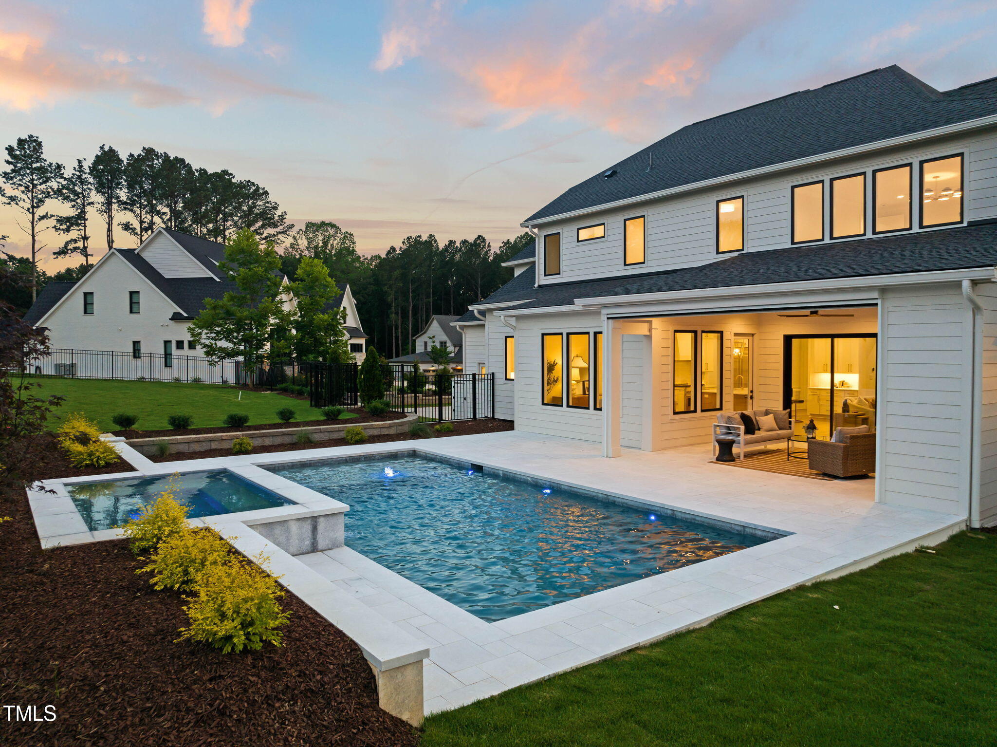 1608 Legacy Ridge Lane Wake Forest, NC 27587 - Photo 69 of 74 a view of a house with swimming pool and sitting area