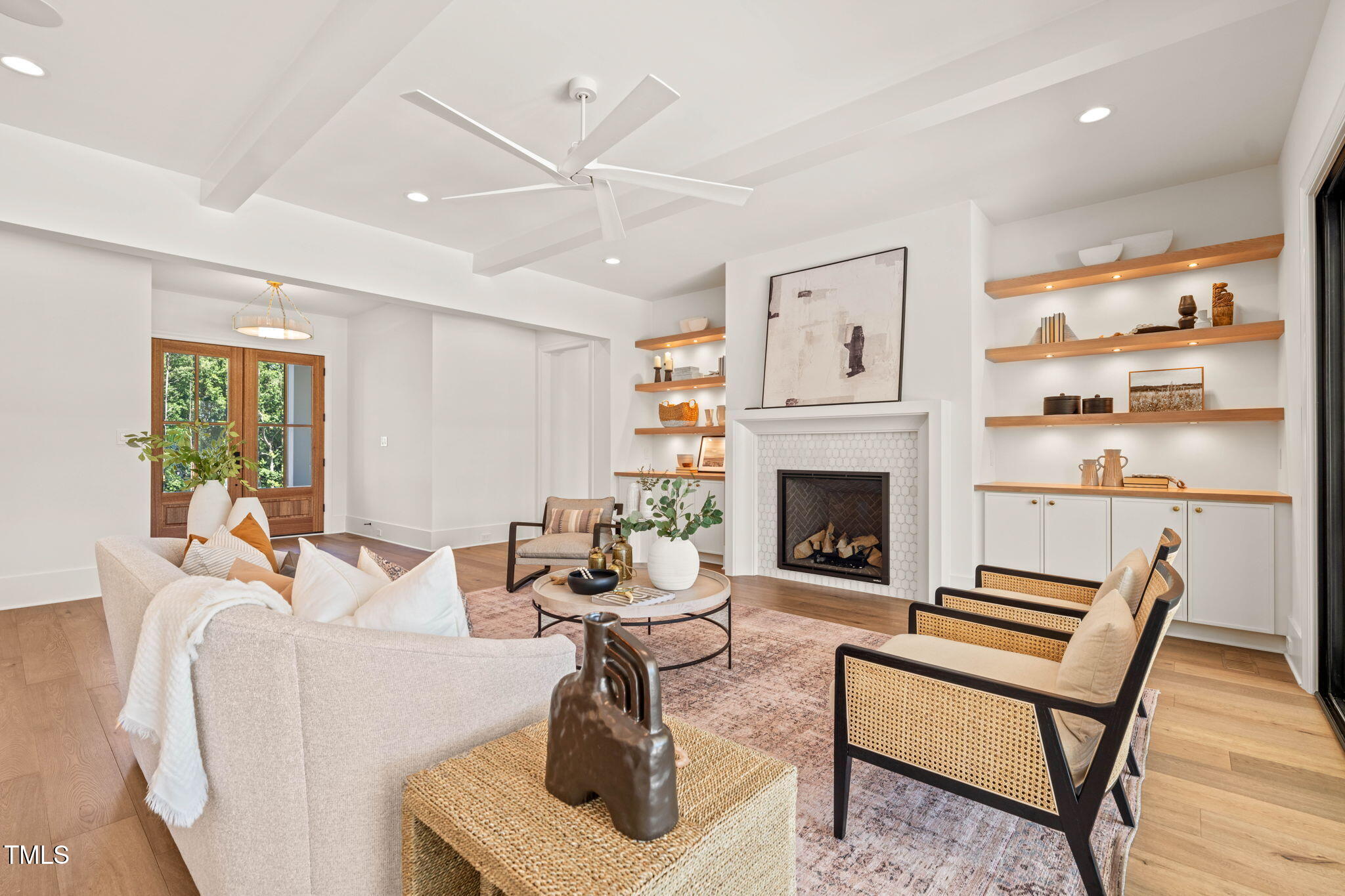 1608 Legacy Ridge Lane Wake Forest, NC 27587 - Photo 7 of 74 a living room with furniture a window and a fireplace