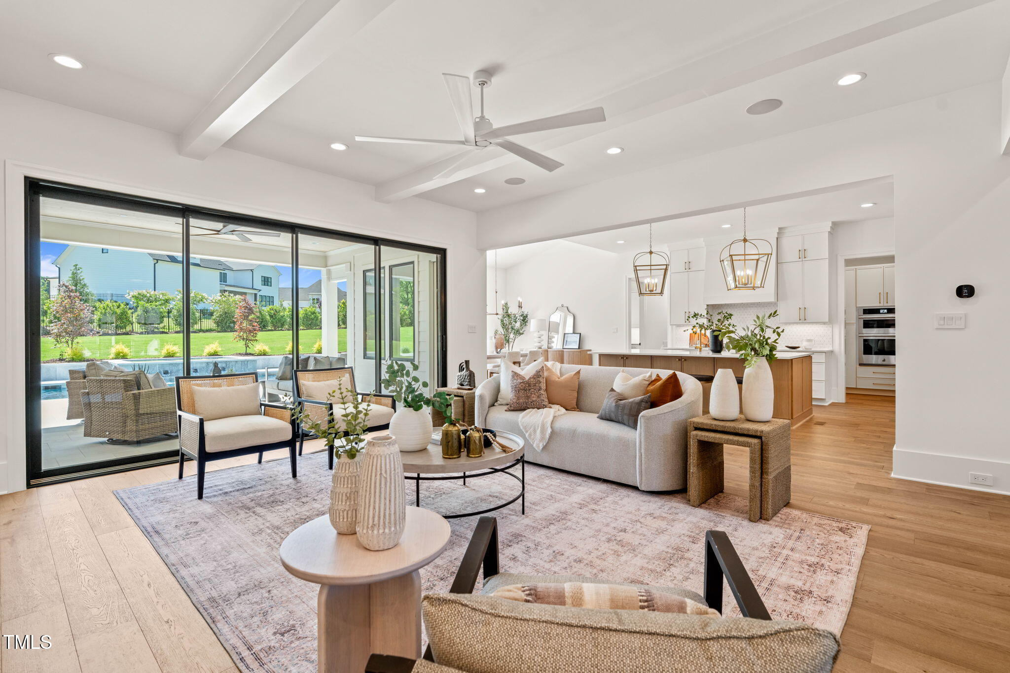 1608 Legacy Ridge Lane Wake Forest, NC 27587 - Photo 8 of 74 a living room with fireplace furniture and a large window