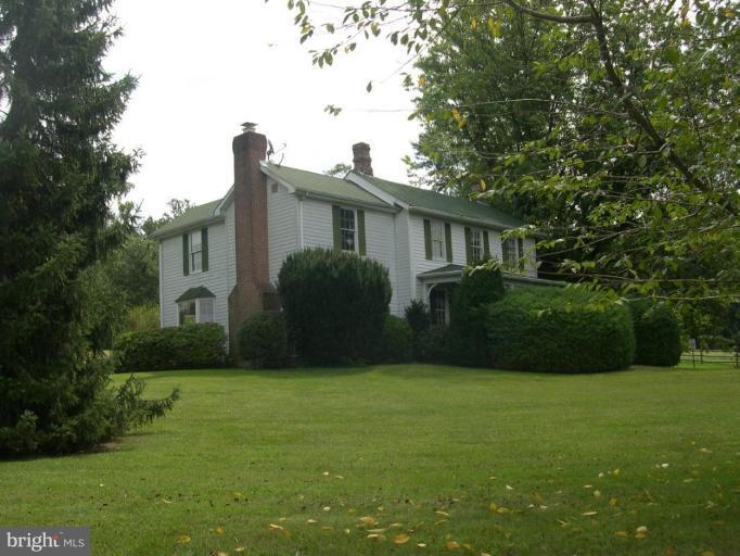 13575 Pleasantville Road Baldwin, MD 21013 - Photo 1 of 21 a view of a house with backyard and garden