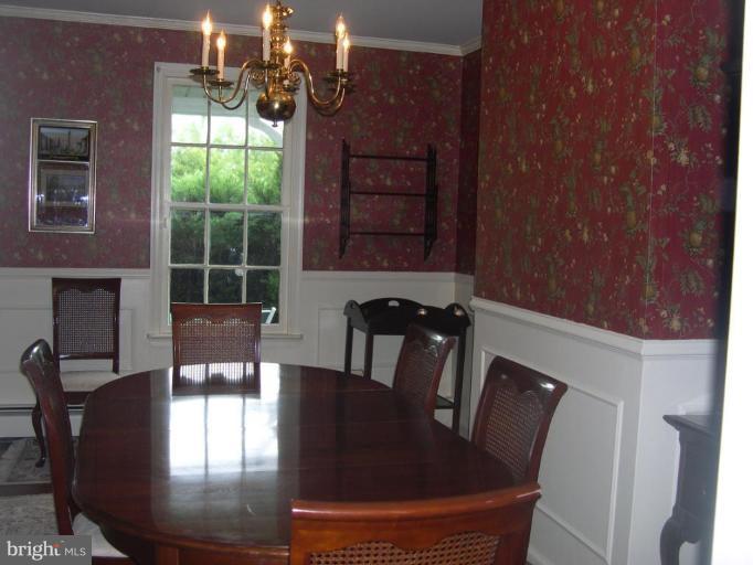 13575 Pleasantville Road Baldwin, MD 21013 - Photo 14 of 21 a view of a dining room with furniture window and outside view