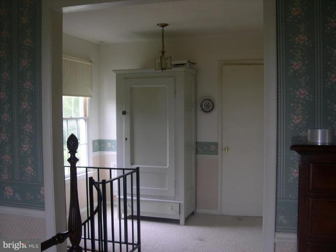 13575 Pleasantville Road Baldwin, MD 21013 - Photo 19 of 21 a view of a hallway with entryway door
