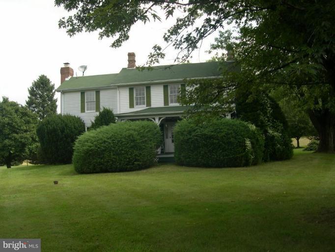 13575 Pleasantville Road Baldwin, MD 21013 - Photo 4 of 21 a view of a house next to a big yard