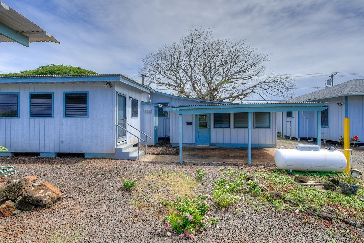 3161 Poipu Road Koloa, HI 96756 - Photo 11 of 29 a front view of a house with patio