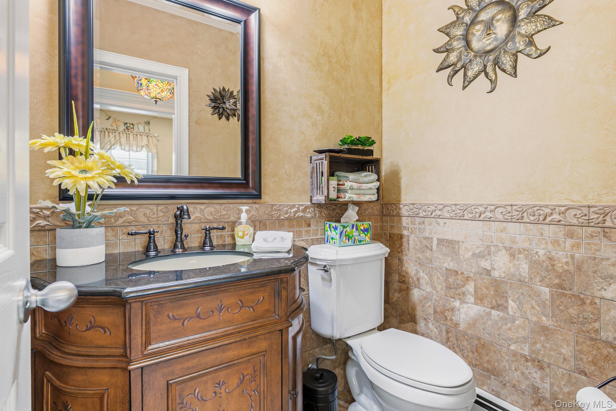 283 Pipe Stave Hollow Road Miller Place, NY 11764 - Photo 24 of 39 Half Bathroom/Powder Room Between The Kitchen & The Den/Family Room.