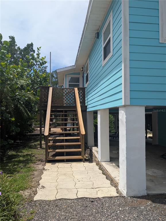 2190 South Seaport Point Crystal River, FL 34429 - Photo 2 of 40 a view of a house with a yard