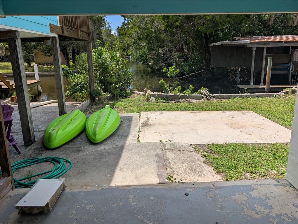 2190 South Seaport Point Crystal River, FL 34429 - Photo 26 of 40 a view of a garden with an outdoor seating