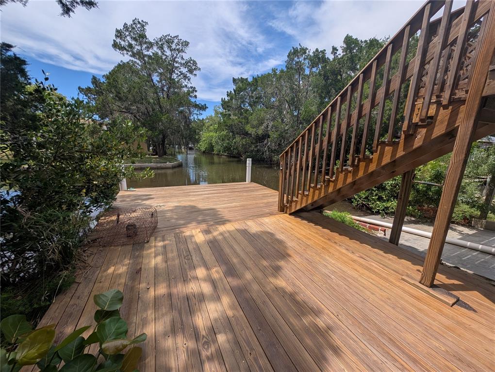 2190 South Seaport Point Crystal River, FL 34429 - Photo 29 of 40 a view of backyard with deck and wooden floor