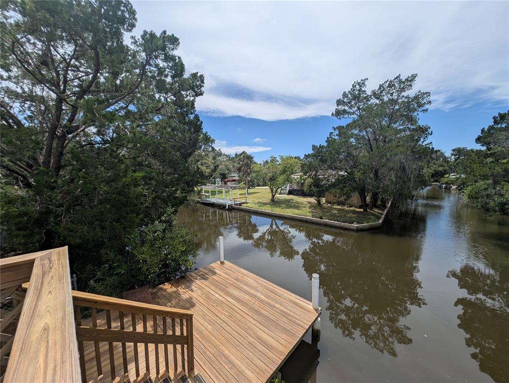 2190 South Seaport Point Crystal River, FL 34429 - Photo 38 of 40 a view of a lake with a deck