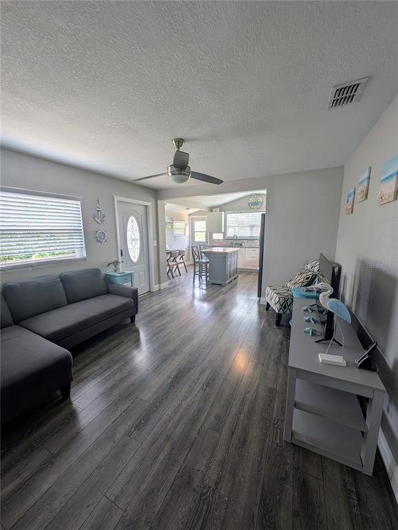 2190 South Seaport Point Crystal River, FL 34429 - Photo 6 of 40 a living room with furniture and a wooden floor