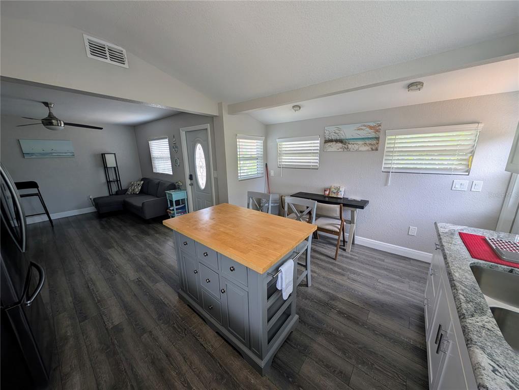 2190 South Seaport Point Crystal River, FL 34429 - Photo 9 of 40 a living room with furniture and a wooden floor