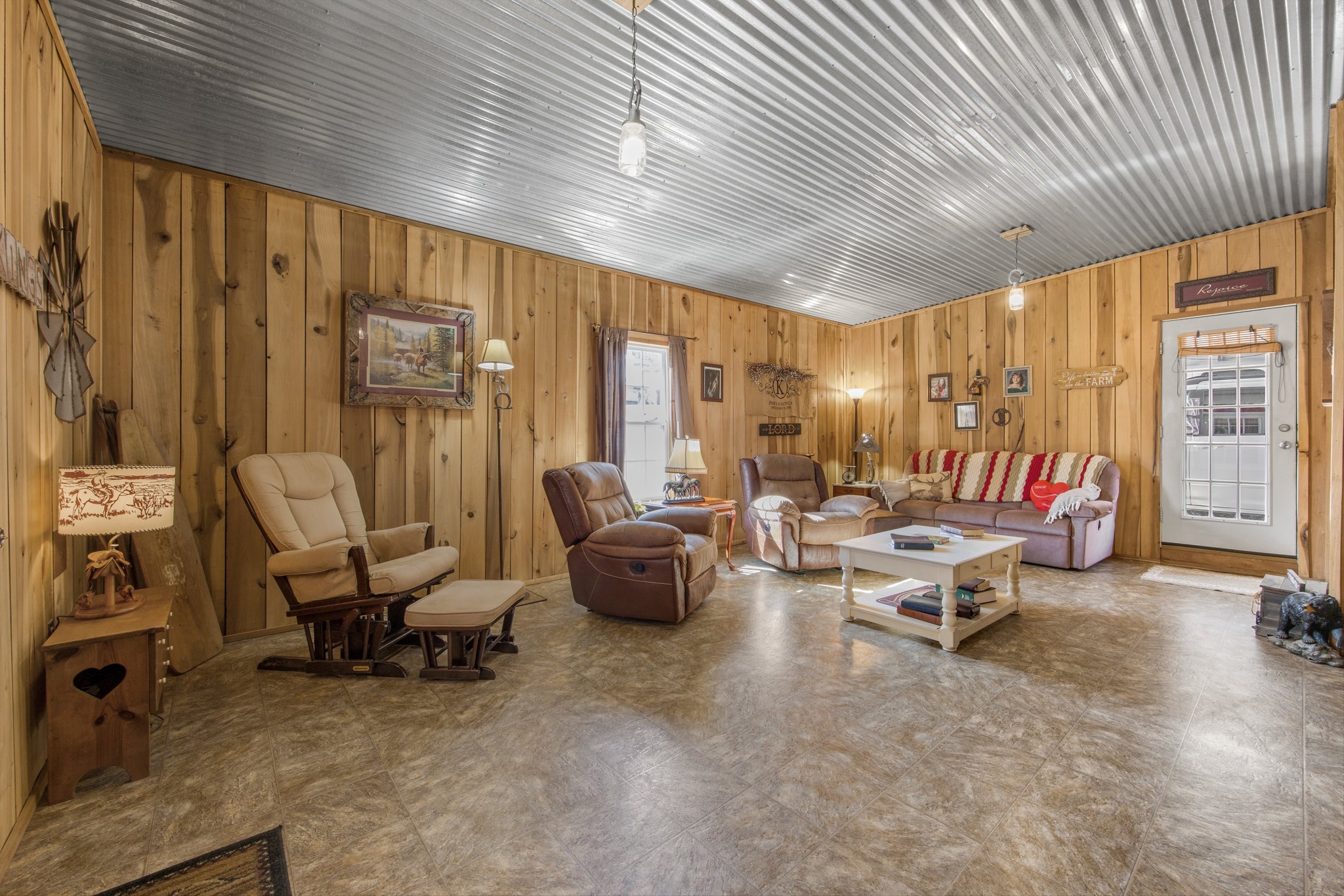 840 Bates Hollow Road Prospect, TN 38477 - Photo 5 of 54 a living room with furniture and a large window