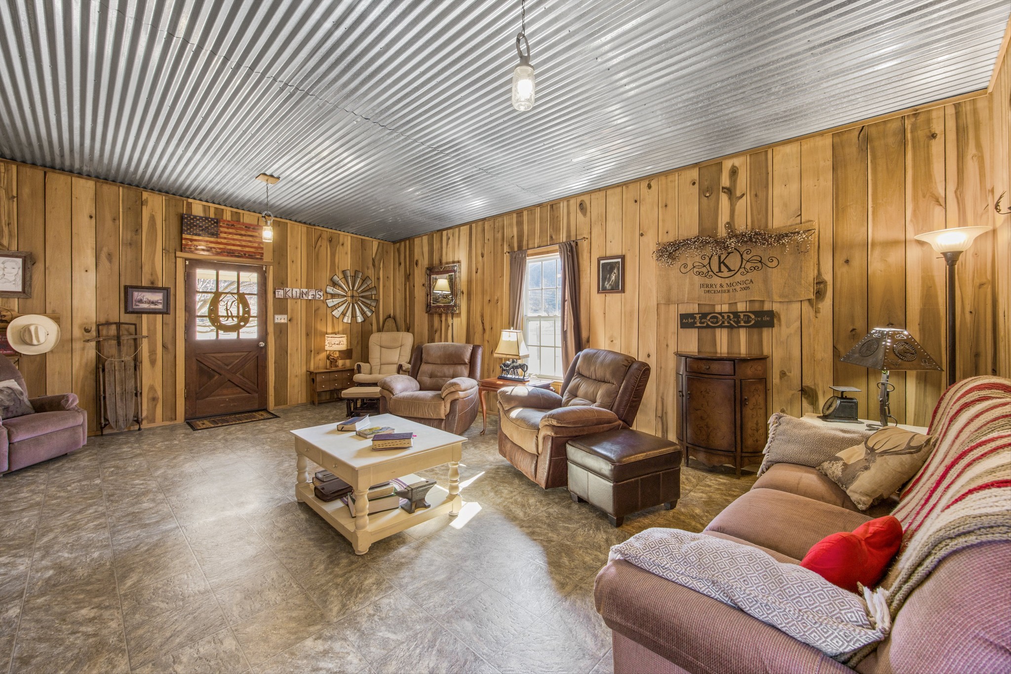 840 Bates Hollow Road Prospect, TN 38477 - Photo 7 of 54 a living room with furniture and a large window