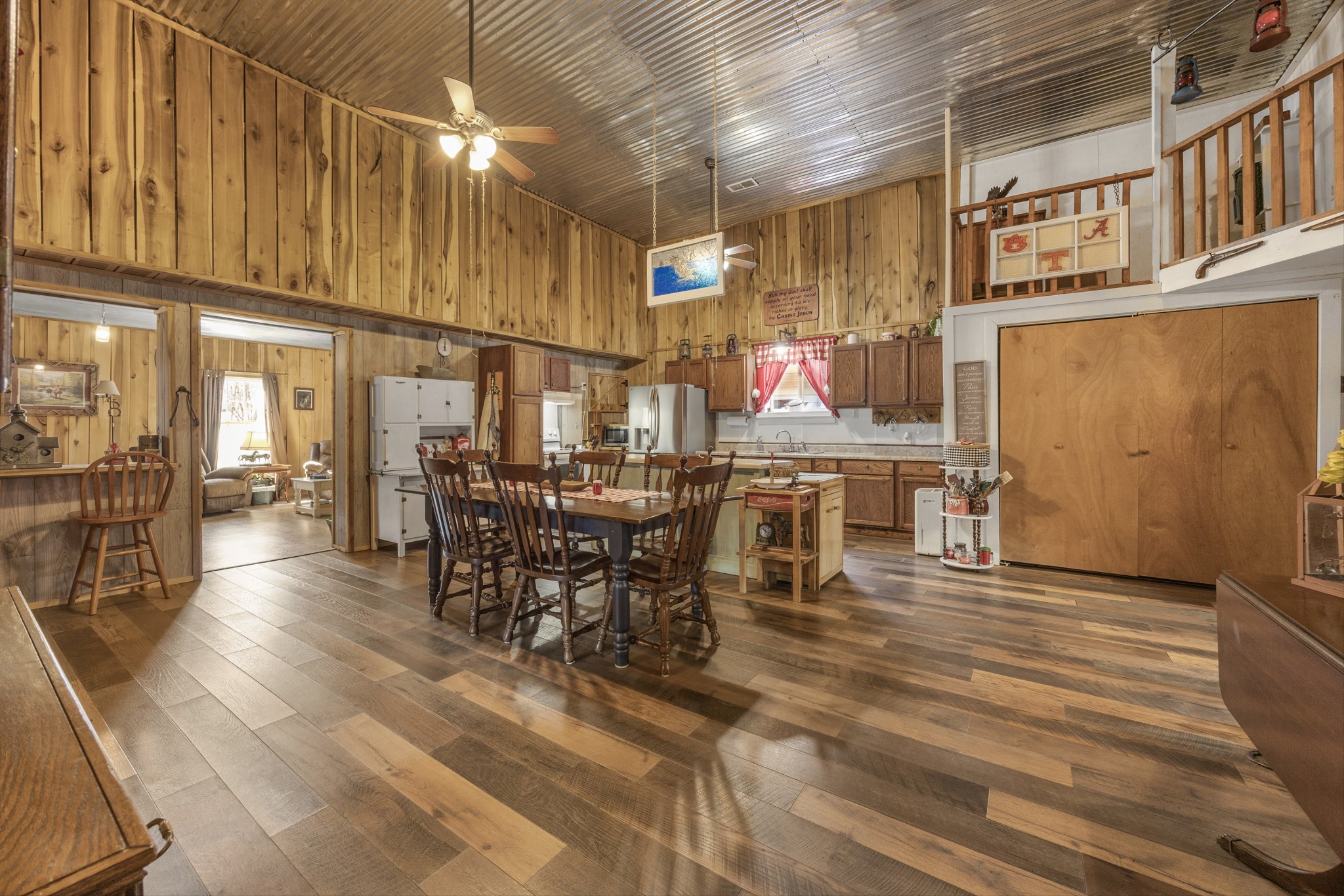 840 Bates Hollow Road Prospect, TN 38477 - Photo 9 of 54 a dining room with furniture and wooden floor
