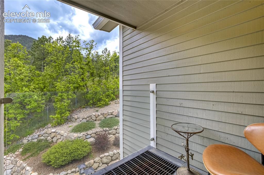 3 Thayer Road Colorado Springs, CO 80906 - Photo 32 of 50 Enjoy morning coffee among the pines from this secluded outdoor escape featuring a Bromic radiant heater.