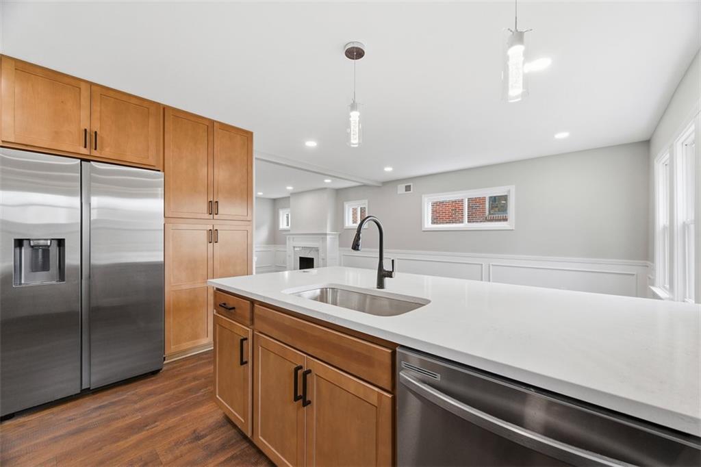2214 Saranac Avenue Pittsburgh, PA 15216 - Photo 13 of 39 a kitchen with a sink and refrigerator