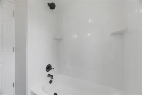 a bathroom with a tub