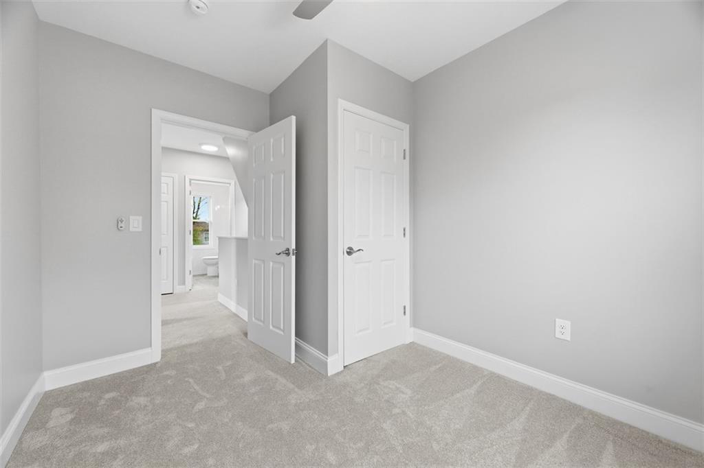2214 Saranac Avenue Pittsburgh, PA 15216 - Photo 25 of 39 an empty room with mirror in a kitchen