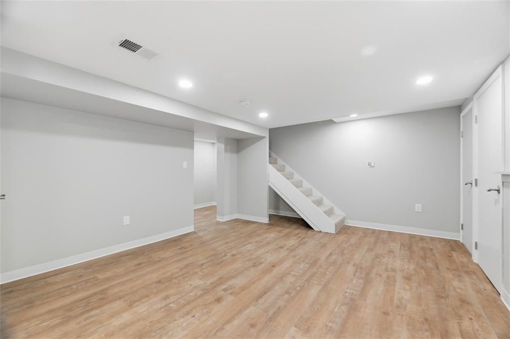 2214 Saranac Avenue Pittsburgh, PA 15216 - Photo 26 of 39 an empty room with wooden floor and windows