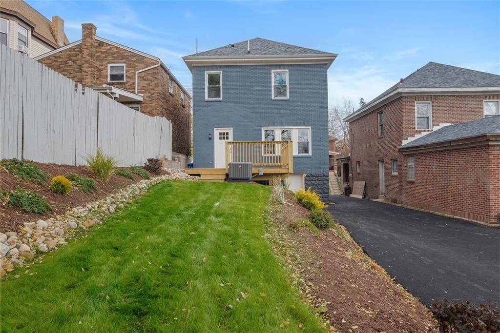 2214 Saranac Avenue Pittsburgh, PA 15216 - Photo 33 of 39 a view of a front of a house with a yard