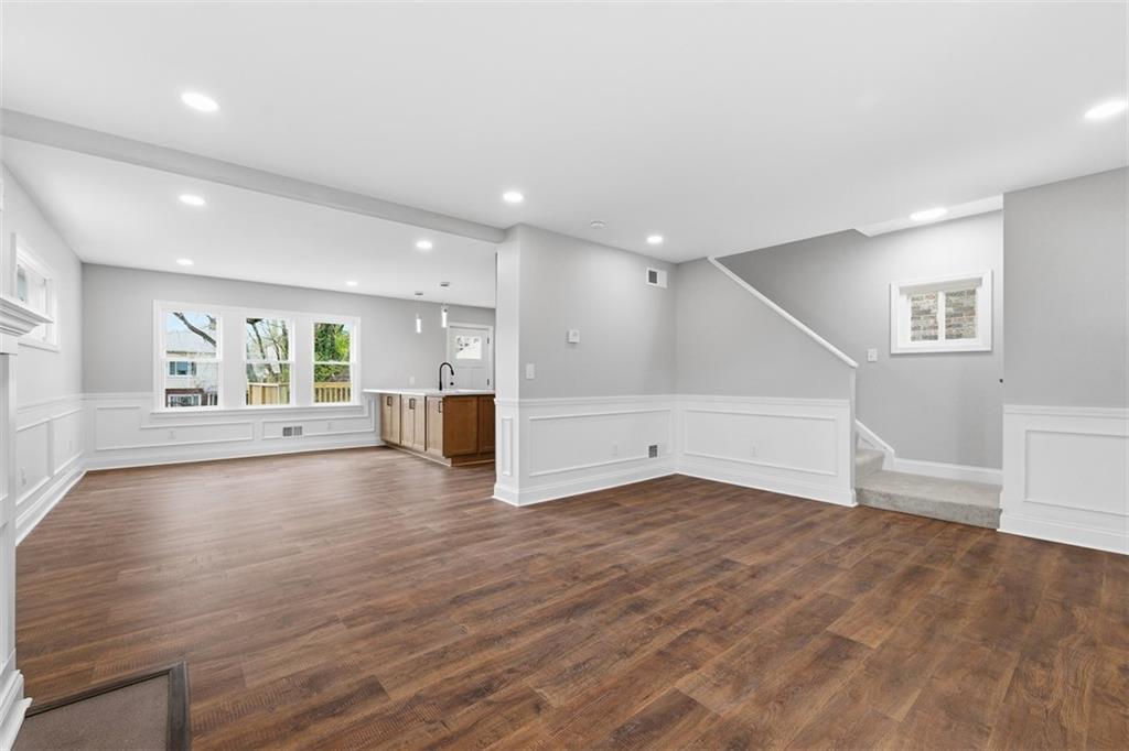 2214 Saranac Avenue Pittsburgh, PA 15216 - Photo 7 of 39 a view of empty room with wooden floor and window