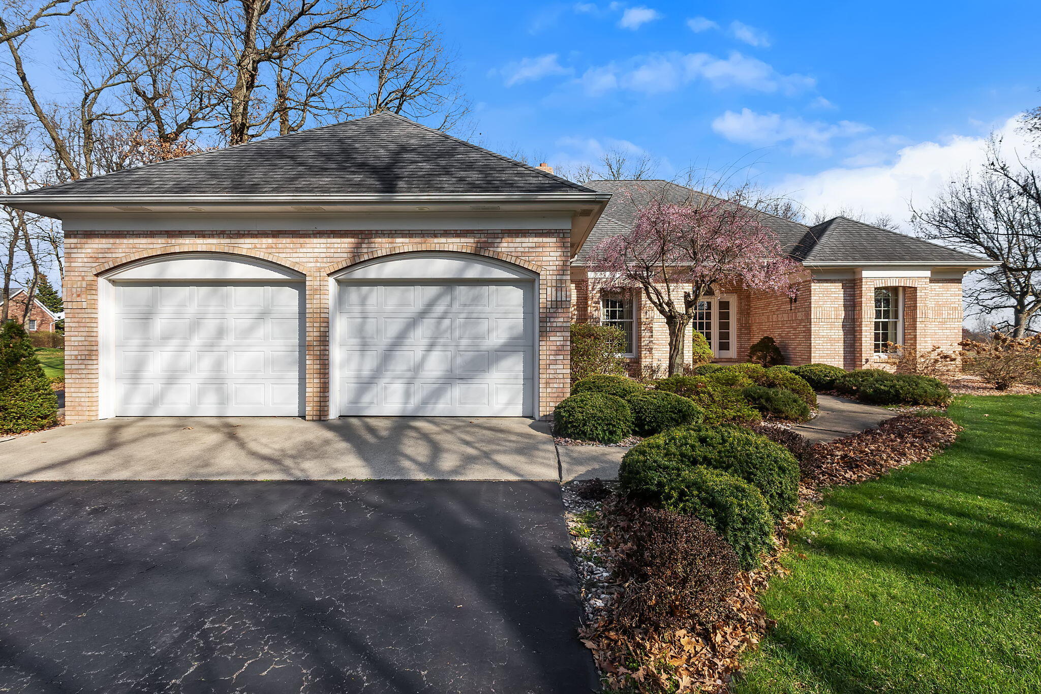 6664 Ridgeview Drive Demotte, IN 46310 - Photo 11 of 65 a front view of a house with a yard