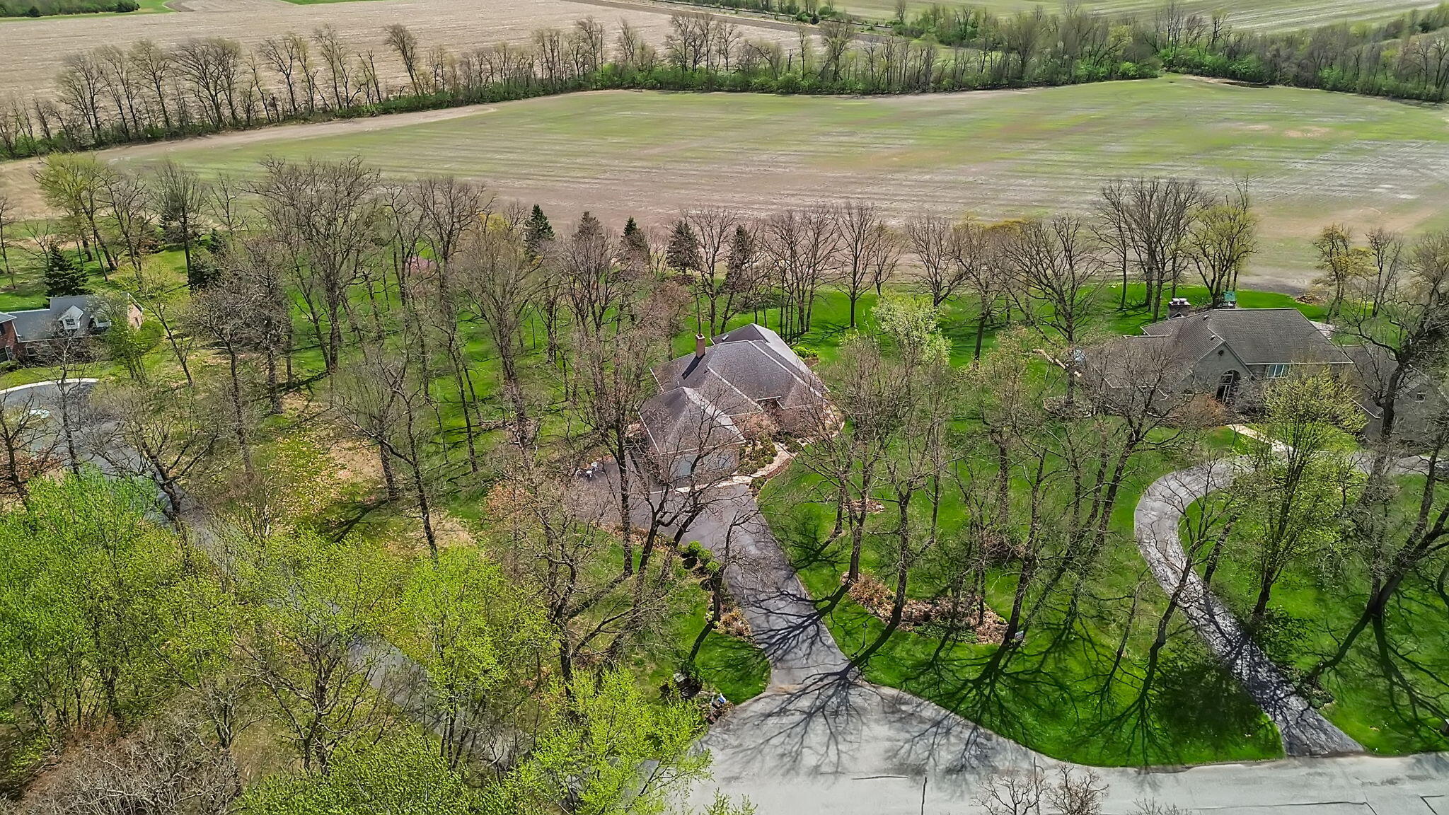6664 Ridgeview Drive Demotte, IN 46310 - Photo 2 of 65 a view of a field with an ocean view