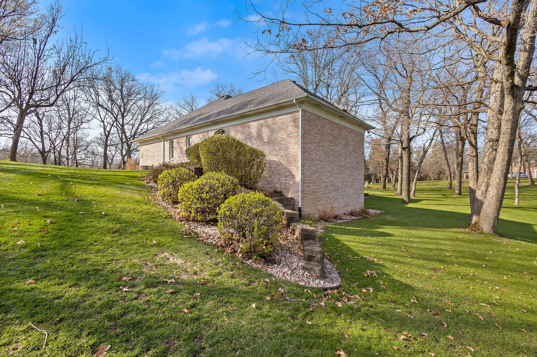 6664 Ridgeview Drive Demotte, IN 46310 - Photo 50 of 65 a backyard of a house with lots of green space