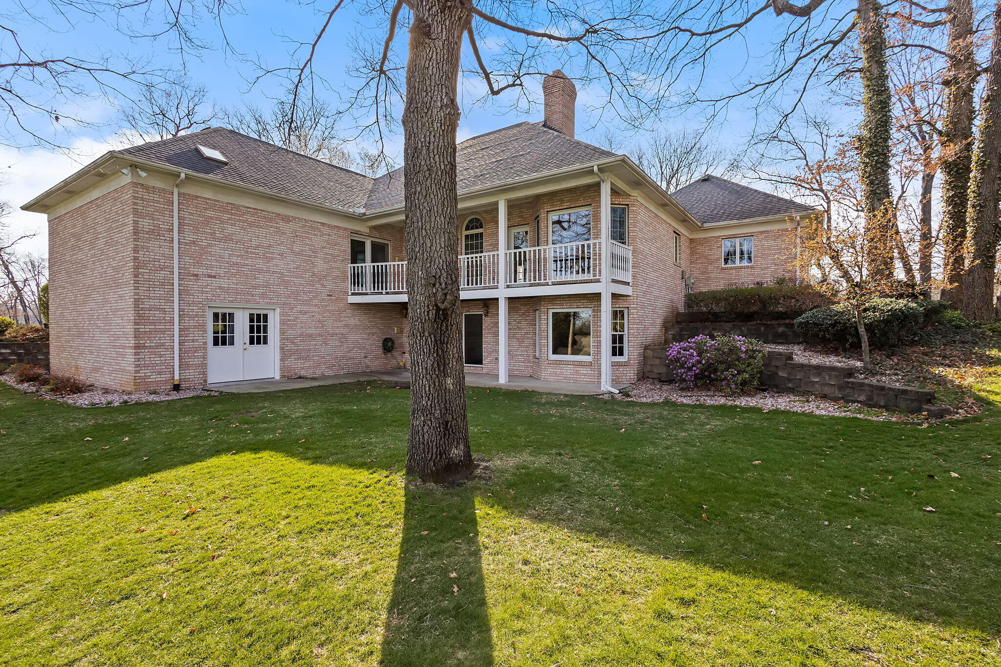 6664 Ridgeview Drive Demotte, IN 46310 - Photo 53 of 65 a front view of a house with a garden
