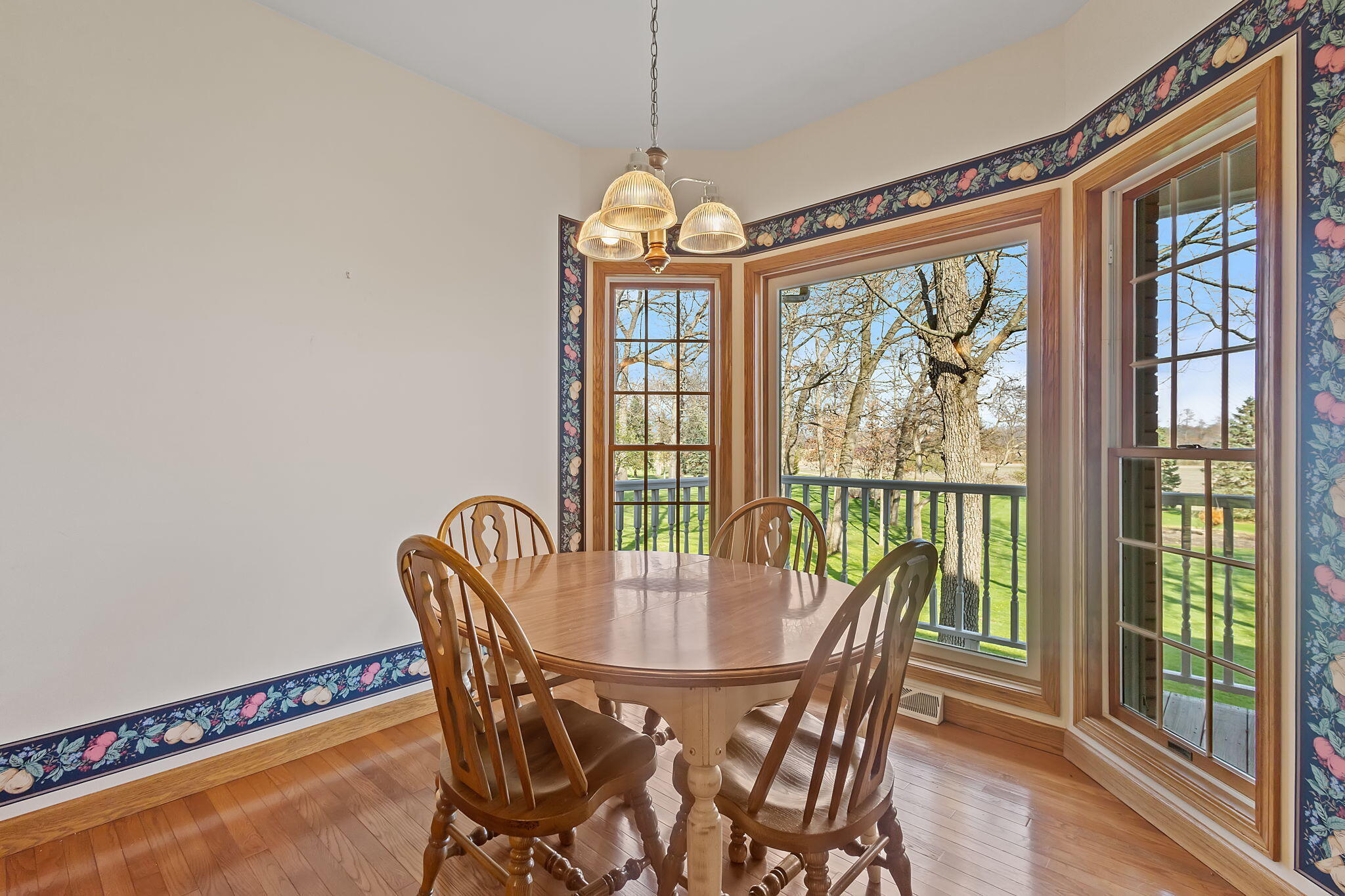 6664 Ridgeview Drive Demotte, IN 46310 - Photo 9 of 65 a view of a dining room with furniture window and outside view