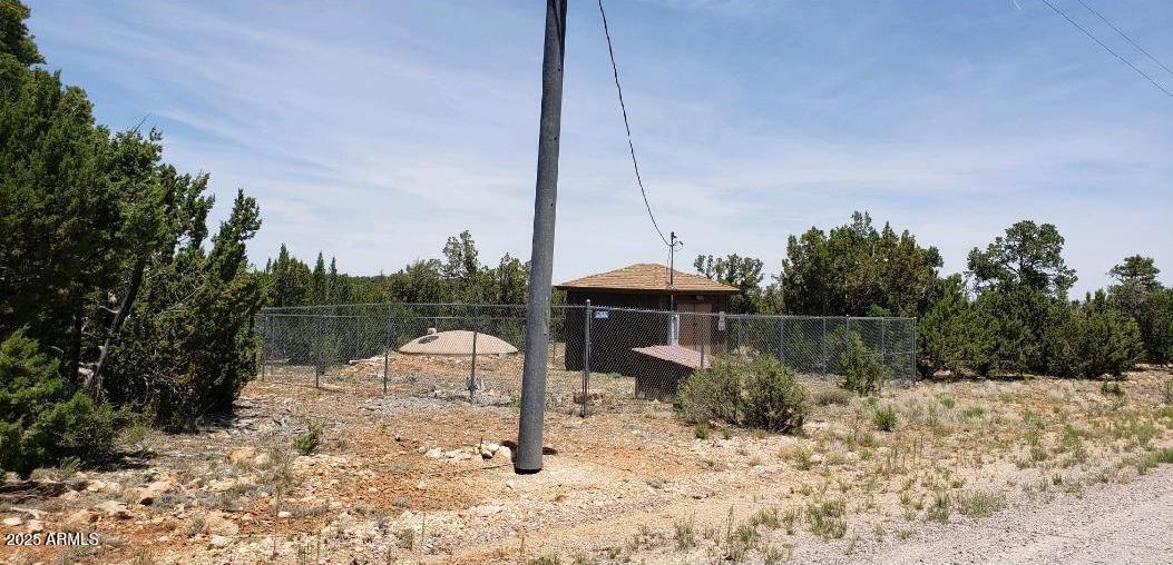 5113 Sunset Ridge Loop, Unit 187 Happy Jack, AZ 86024 - Photo 8 of 12 a view of a lake with a park