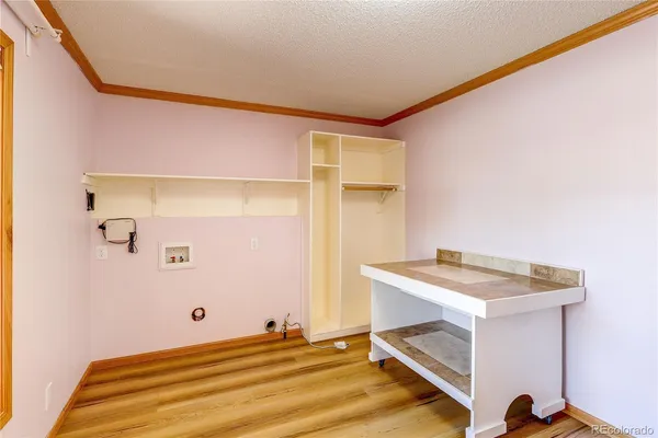 a room with a bed and a table in it