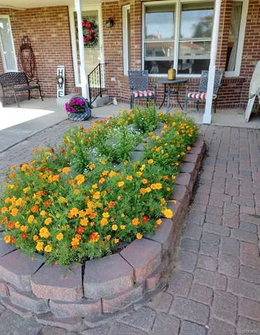 a view of a tables and chairs in patio