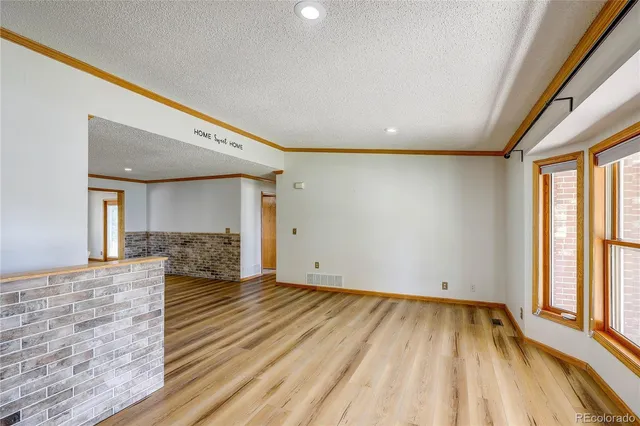 a view of an empty room and window