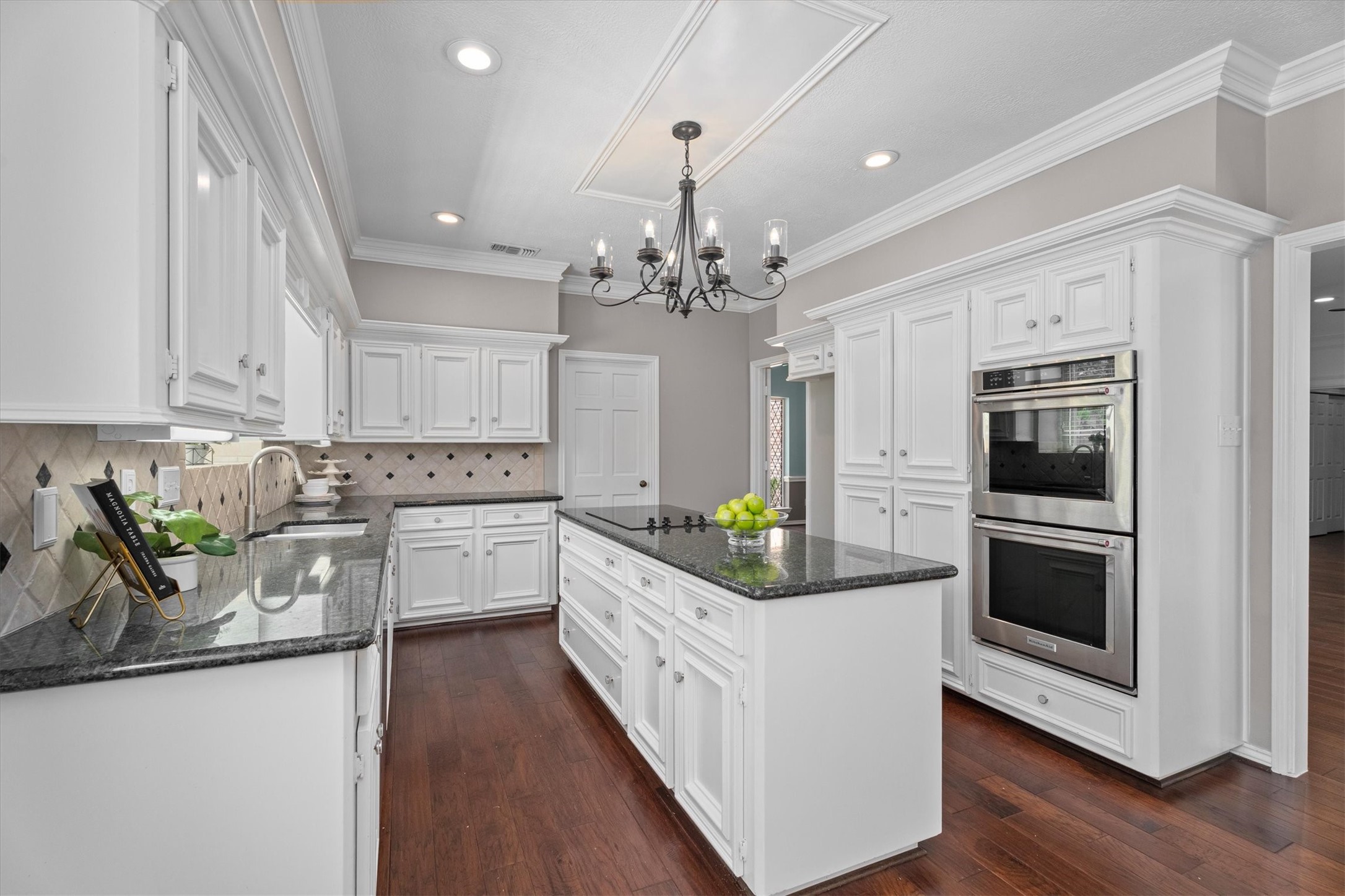 16267 Salmon Lane Spring, TX 77379 - Photo 11 of 48 Another view of the kitchen showcases the expansive counter space, and openings to the dining room and family room.