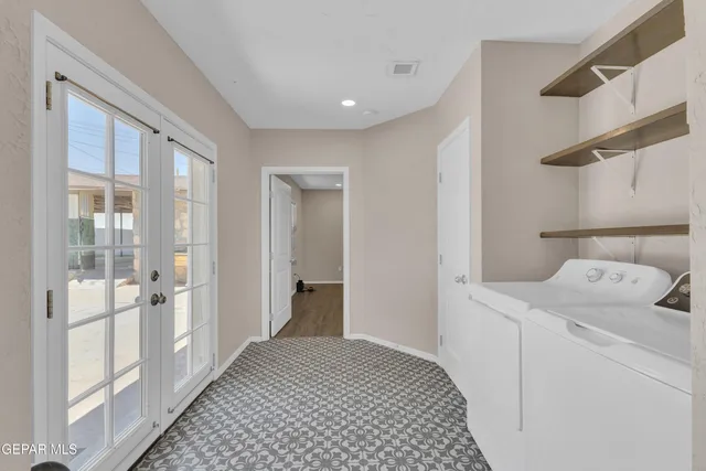 a bathroom with a sink and a shower