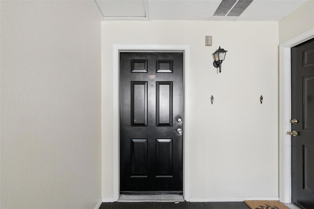 2332 Melissa Drive Waco, TX 76708 - Photo 2 of 15 Doorway to property featuring stucco siding
