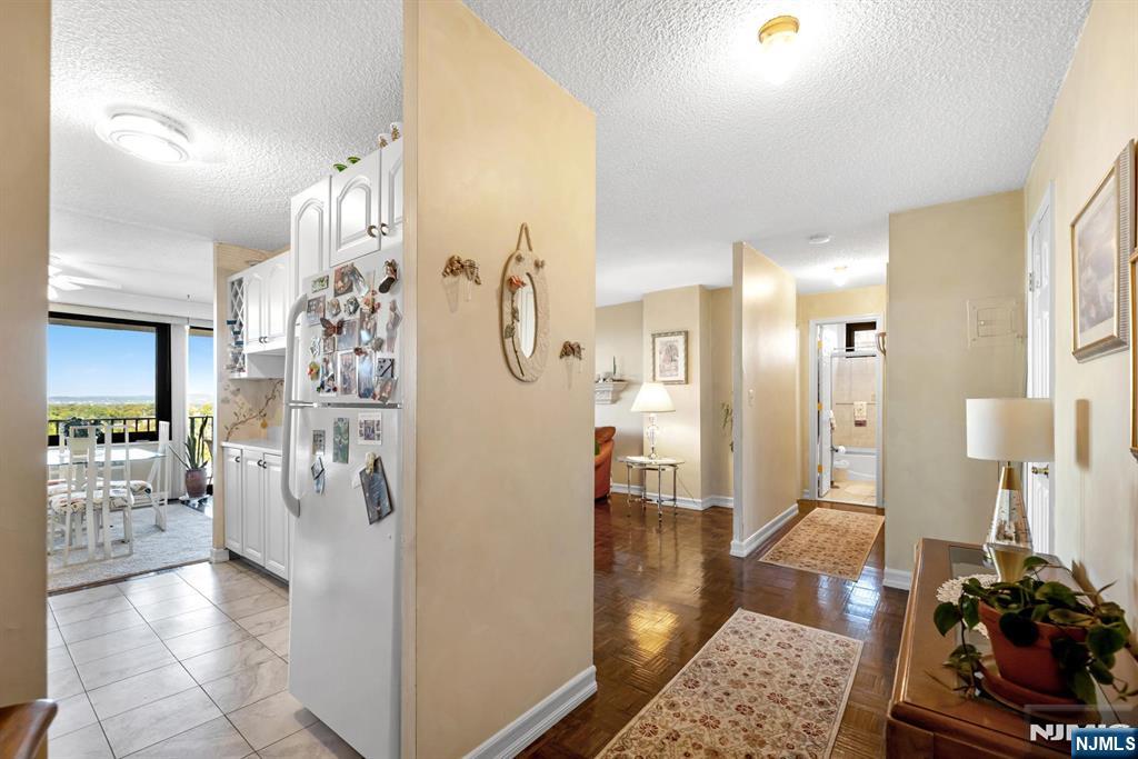 277 Prospect Avenue, Unit 10B Hackensack, NJ 07601 - Photo 21 of 34 a view of a livingroom with furniture and a livingroom