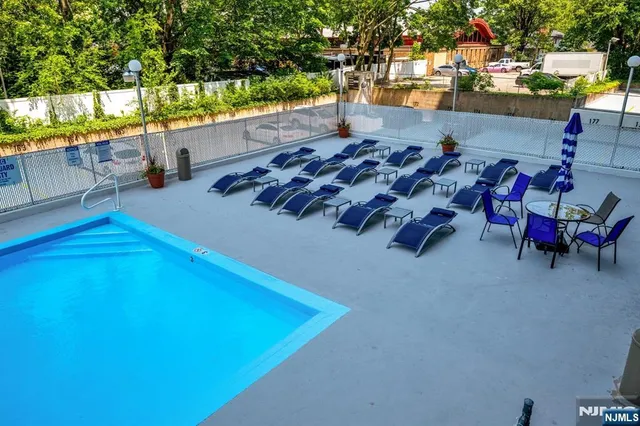 a view of a terrace with chairs