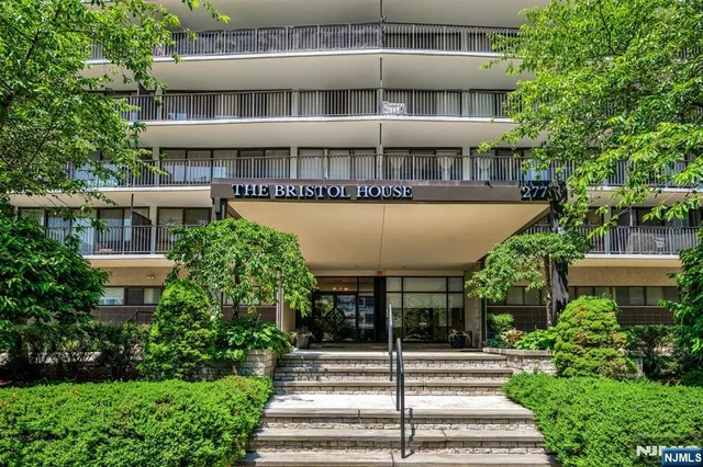 a view of a building with a garden