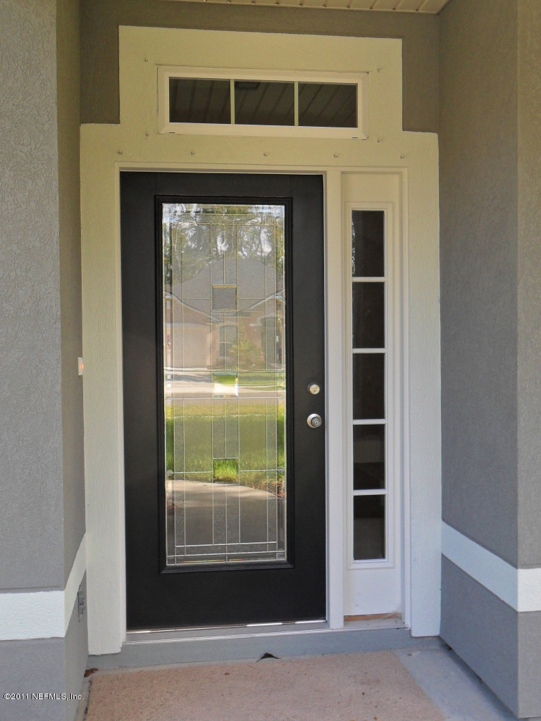 97218 Bluff View Circle, Unit ROSES BLUFF LOT 37 Yulee, FL 32097 - Photo 4 of 52 a view of front door