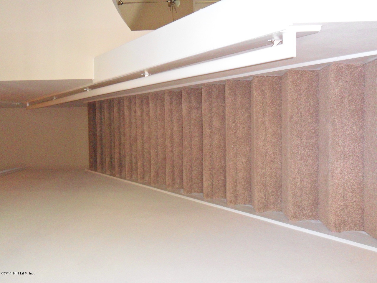 97218 Bluff View Circle, Unit ROSES BLUFF LOT 37 Yulee, FL 32097 - Photo 6 of 52 a view of a garage