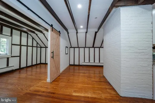 a view of a hallway with staircase