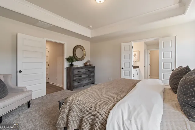 a bathroom with double sink and a mirror