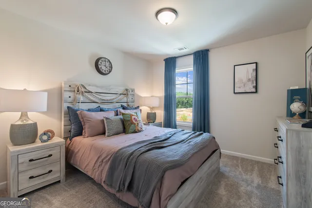 a bathroom with a sink a toilet a mirror a vanity and shower